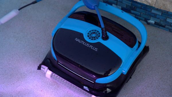 Dolphin Nautilus CC Plus working along a pool wall