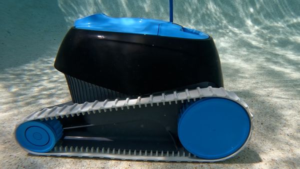 Underwater view of the Dolphin Nautilus CC tracks moving across the pool floor
