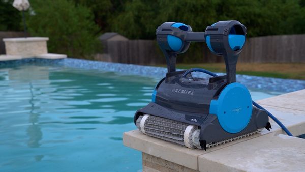Dolphin Premier sitting on the pool ledge