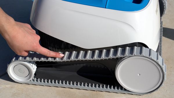 Hand pointing to the Dolphin Proteus DX3's drive tracks up close