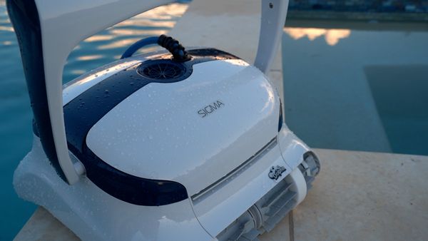 Dolphin Sigma photographed at an angle against a water background